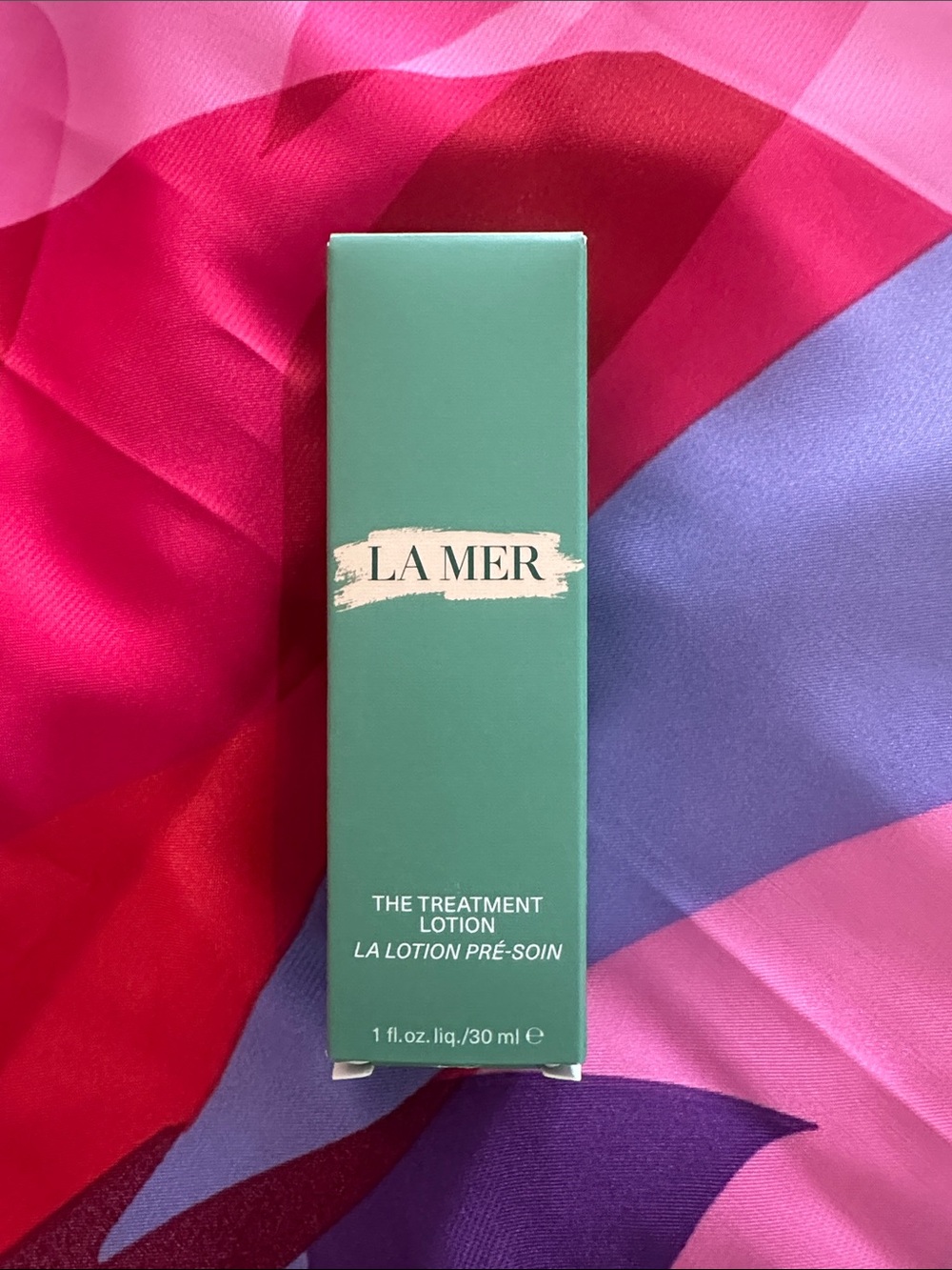 La Mer Treatment Lotion in Green Box with Pink and Purple Accents